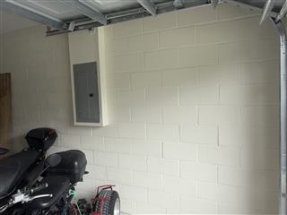 Garage wall repair and repaint project